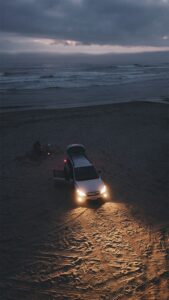 people parked at shore at night