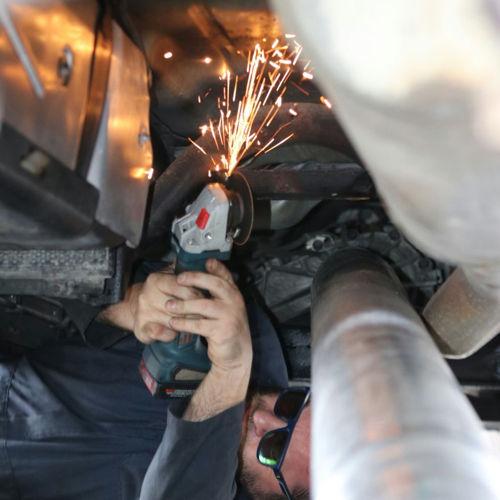 Underframe fitting and function services at Alpha Transmission Houston — expert chassis alignment and automotive undercarriage repair
